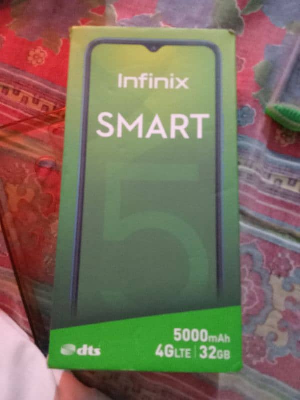 Infinx smart 5 for sale 2/32 full box and charger 2