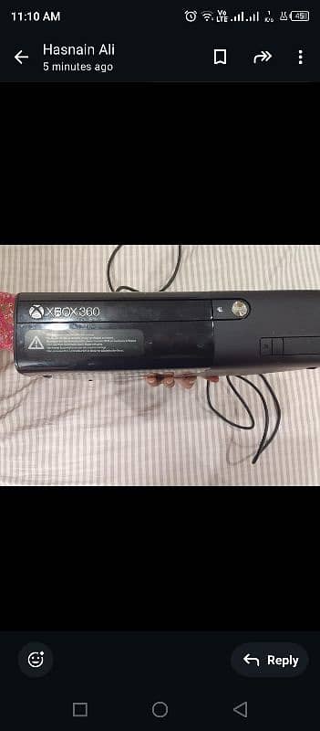 Xbox 360 E with gaming CDS 0