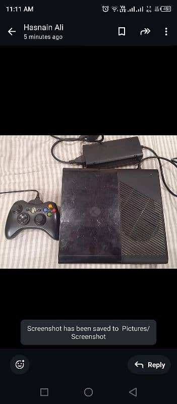 Xbox 360 E with gaming CDS 2