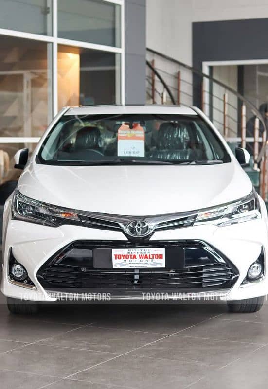 Toyota Altis Grande White with Black 2025 0