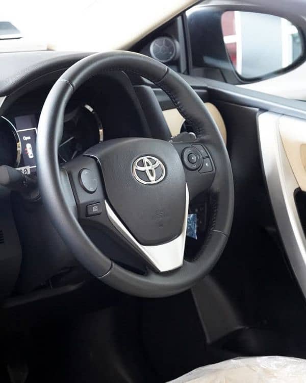 Toyota Altis Grande White with Black 2025 5