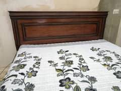 Full size double bed with 2 side tables. without mattress