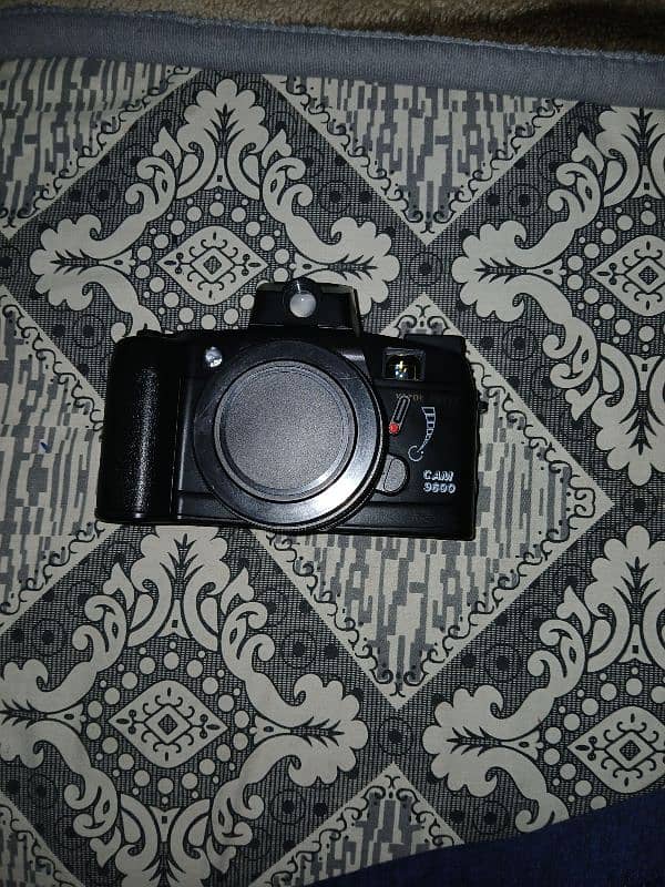 vintage camera with bag 0