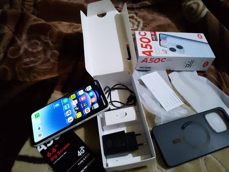 itel a50c 2+2/32Gb with complete box some days used only 03186176864 6