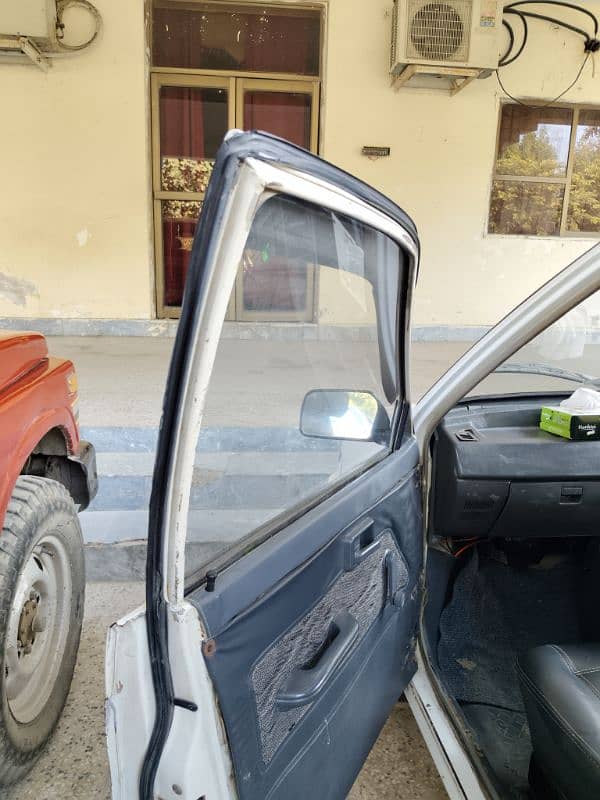 Model 1999 used car Mehran Minor touching 2