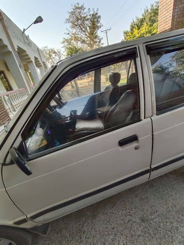 Model 1999 used car Mehran Minor touching 12