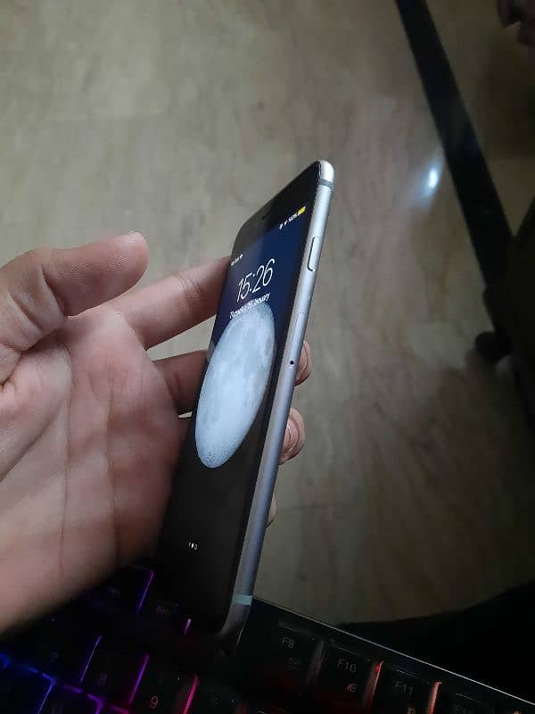 Iphone 6 with cover and wire 5