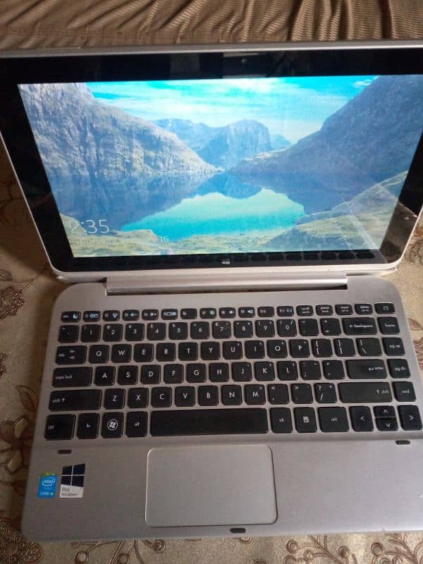 Haier laptop with charger. 1