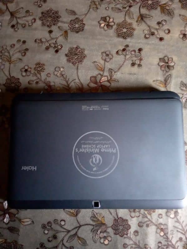 Haier laptop with charger. 2