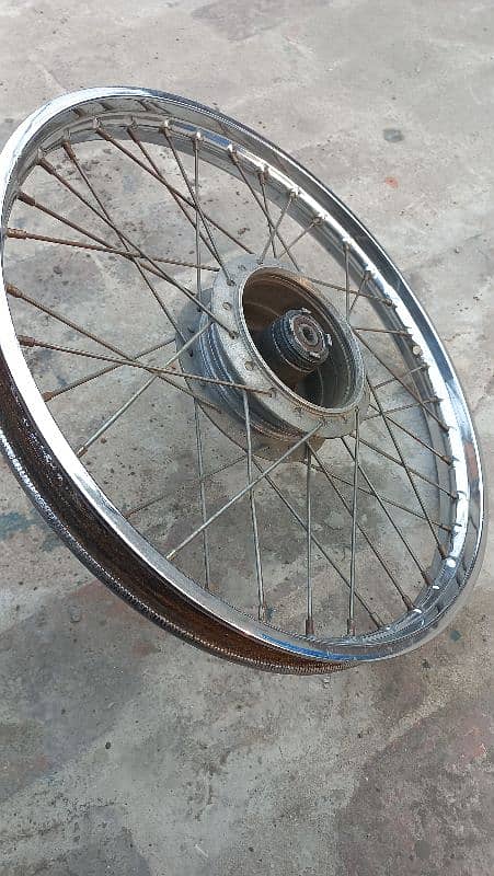 honda 70 wheel set with hub  good contion 9