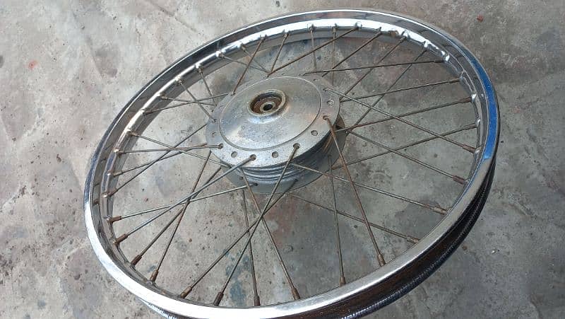 honda 70 wheel set with hub  good contion 10