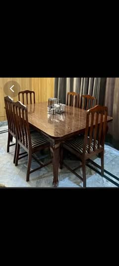 Excellent condition dining table with 6 chairs,polished well maintain