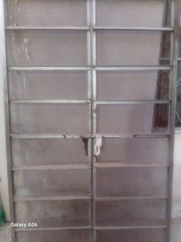 very heavy double door iron gate. 5