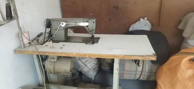 Juki machine for sale with motor.