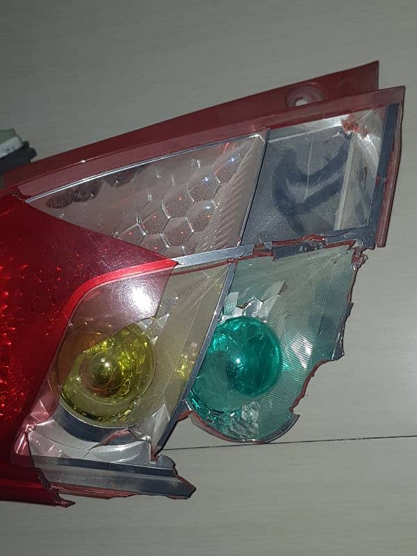 suzuki swift genuine left tail light 0