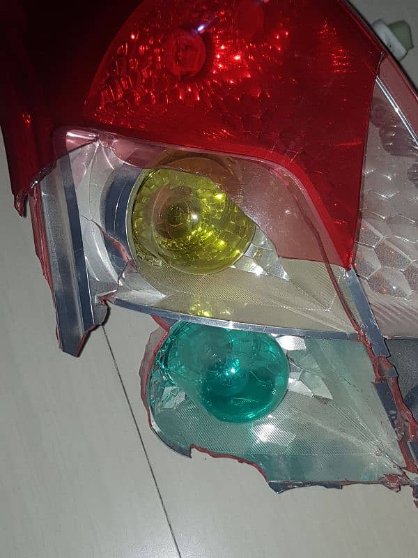 suzuki swift genuine left tail light 1