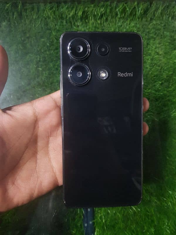 redmi note 13 mid night black 8+4 ram 256 gb 7