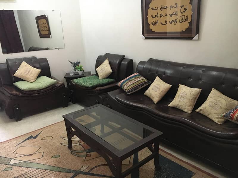 7 seater sofa brown color leather in reasonble condition & Price 0