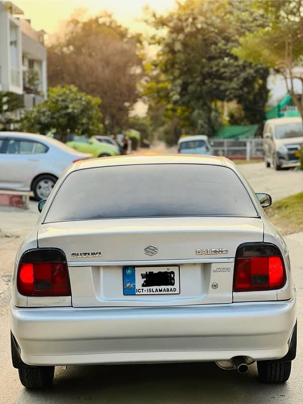 Suzuki Baleno 2005 JXR Silver colour Islamabad number 1