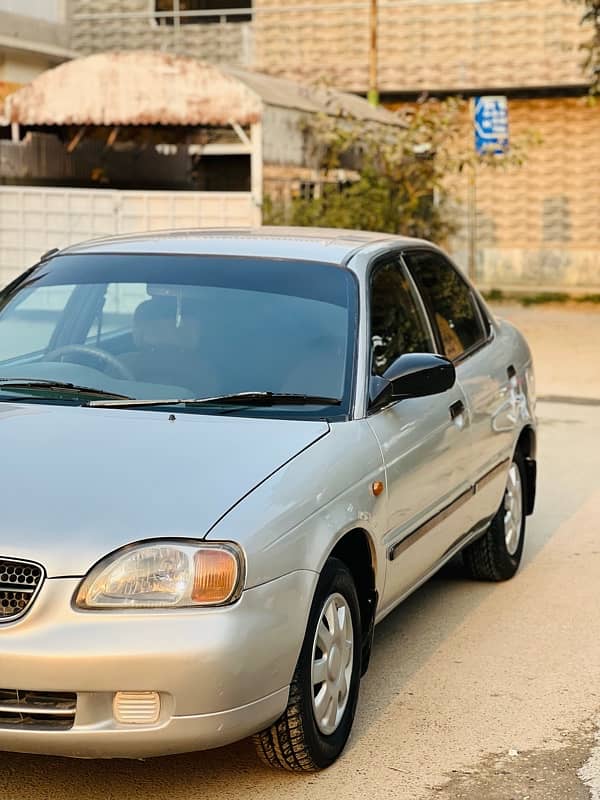 Suzuki Baleno 2005 JXR Silver colour Islamabad number 3