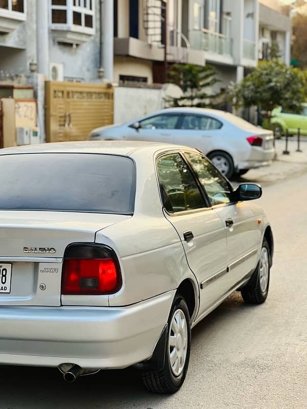 Suzuki Baleno 2005 JXR Silver colour Islamabad number 4