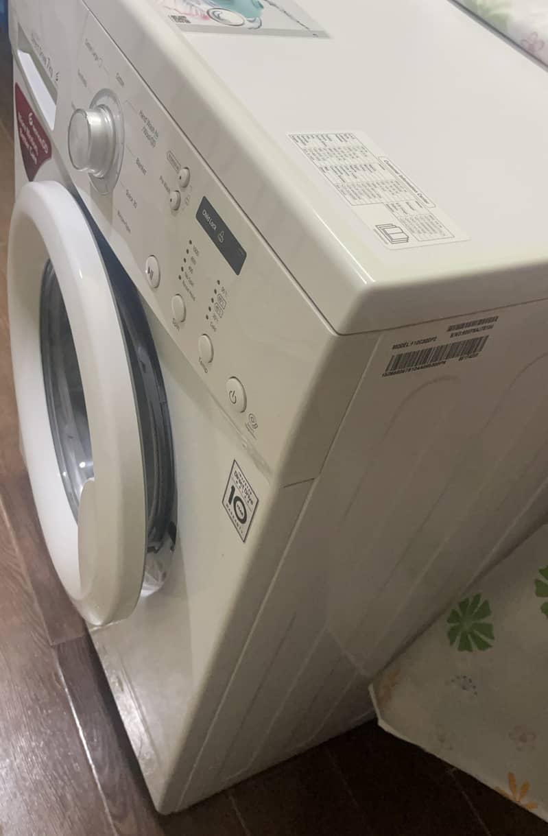 LG washing machine (F10C3QDP2) front load in warranty. 2