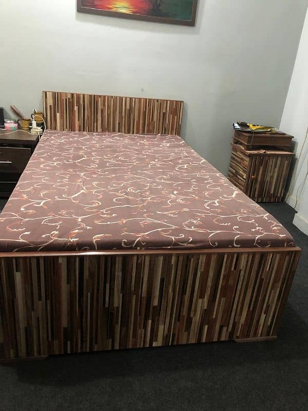 wooden single bed with one side table and mattress 2