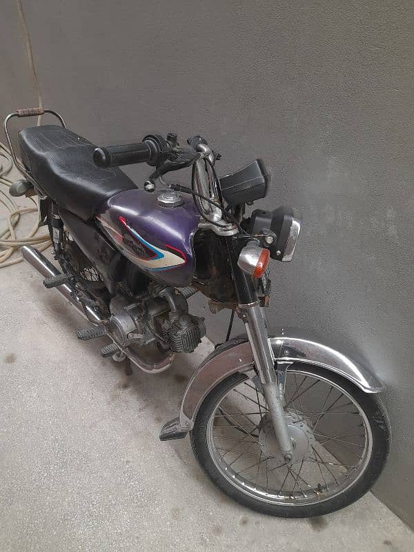 honda 70cc 2000 modal ha file ha book gum ho gayi ha book banwa do ga 2