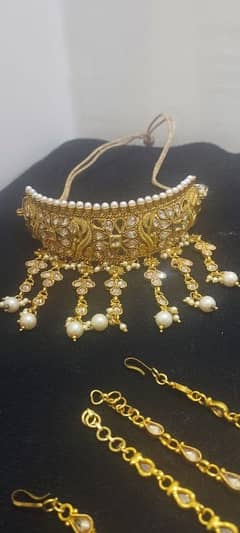 Golden colour bridal set.