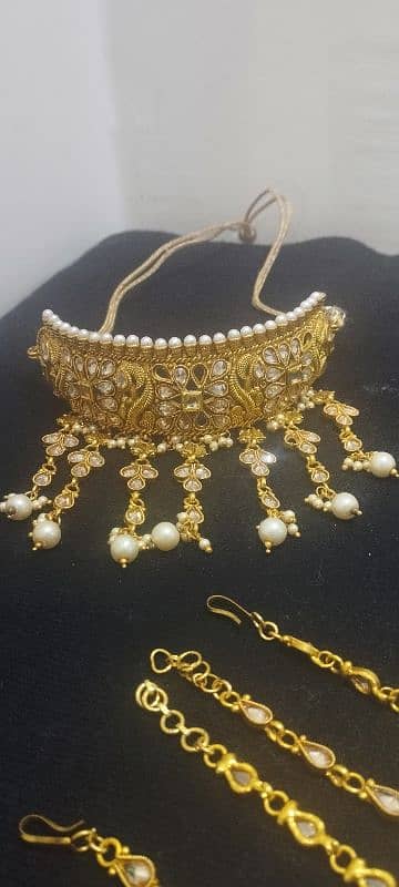 Golden colour bridal set. 0