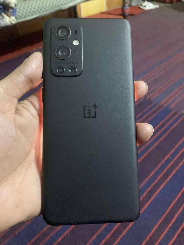 one plus 9pro 12/256 GB  pta  approved panl me line ha jo dark mood 0