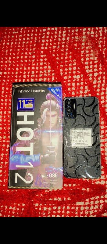 Infinix hot 12 6/128 gb no charger only mobile and box good condition 0