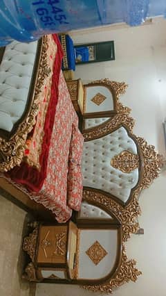 bed with dressing tablet and 2 side tables