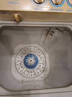 Kenwood Washing machine with dryer for sale.