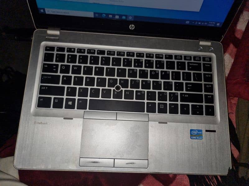 hp 9470 elite book slim laptop 1