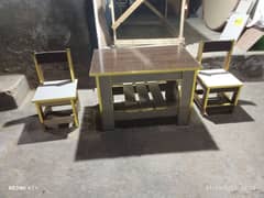 two baby chairs available with table