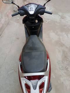 United company sakooty (100cc)red colour