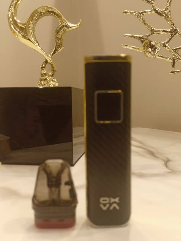 Oxva Xlim pro black gold colour with box and lanyard 6