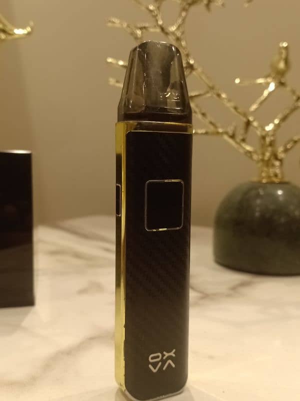 Oxva Xlim pro black gold colour with box and lanyard 7