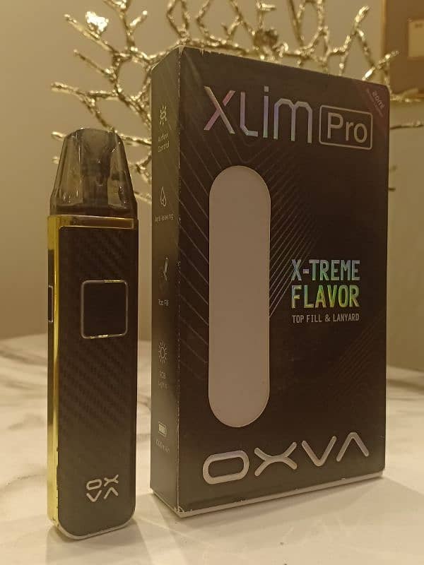 Oxva Xlim pro black gold colour with box and lanyard 8