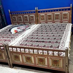 Set of 2 single wooden beds 18000 each