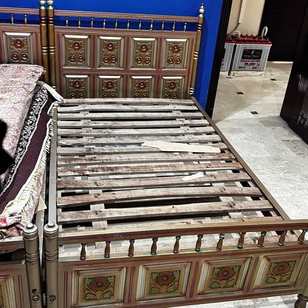 Set of 2 single wooden beds 18000 each 3