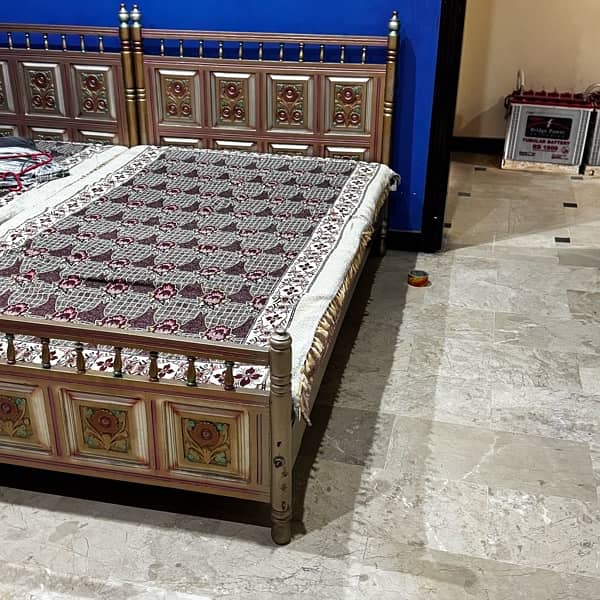 Set of 2 single wooden beds 18000 each 4