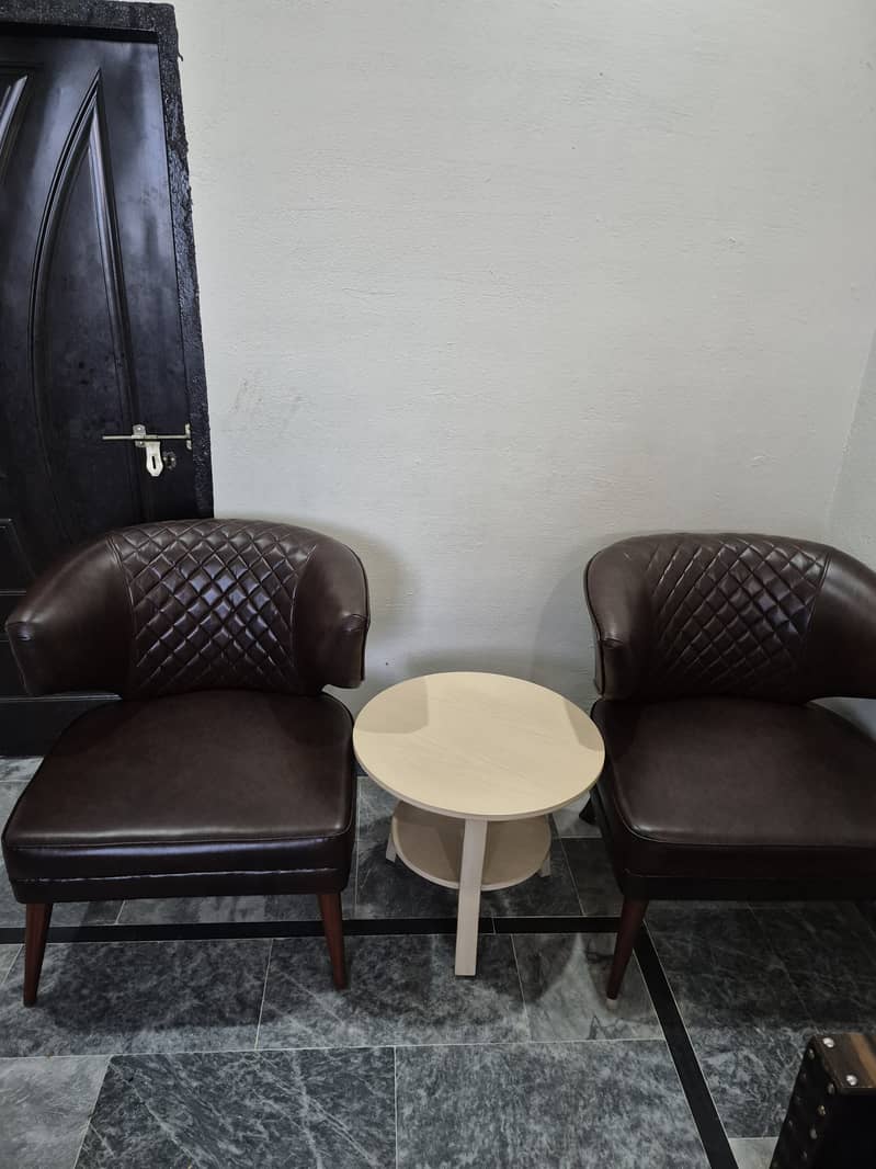 Leather chairs with centre table 1