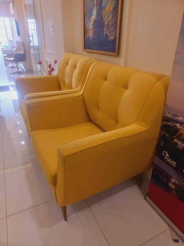 2 yellow colour sofa chair 2