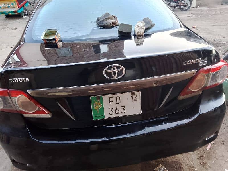 Toyota Corolla XLI 2013 number faisalbad 1