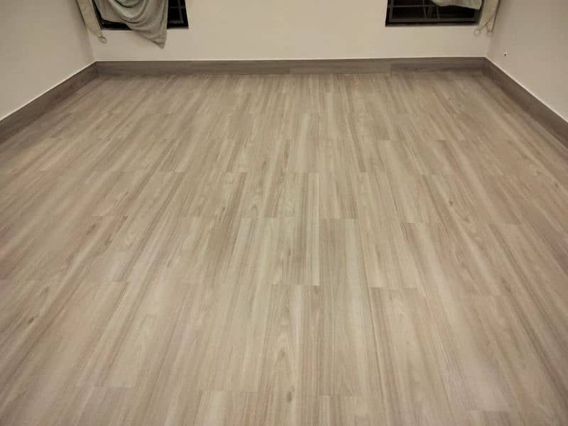 Vinyl Floor Tiles & Wooden Floor. 0