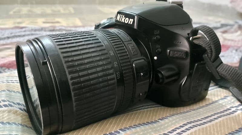 DSLR Nikon d5100 with 18-105 lens 0