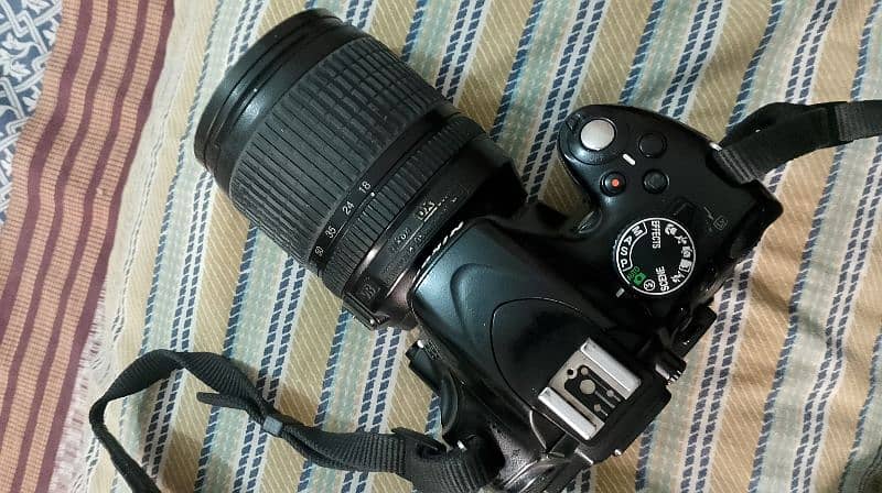 DSLR Nikon d5100 with 18-105 lens 2