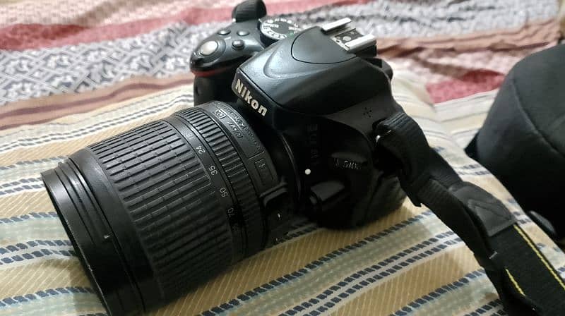 DSLR Nikon d5100 with 18-105 lens 3